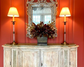 $1400; 84" x 21" x 36"; hand-crafted, distressed 4-door buffet, circa 1970's, in the style of Karges Custom Furnishings with multi-layered colors and a verdi green marble-look inlay                                                          $200; 30" x 17" x 24"; floral arrangement with pomegrantes and gold leaves