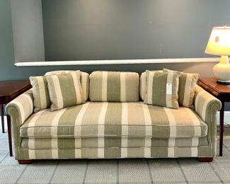 $1800; 84" x 39" x 32"; custom upholstered, striped couch with single seat cushion and three removable back cushions and four throw pillows. 