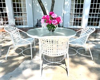 $1300; chairs: 23" x 24" x 32"; table: 54" x 28"; Vintage Brown Jordan, Kantan outdoor patio set with four chairs and a table in white