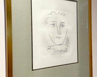SOLD: 19.5" x 23.5"; Pablo Picasso etching, Spain drypoint restuke "Pour Roby"; as is, has some moisture damage which appears to be more on the glass frame than the paper.  Pricing available with conversation at 314-479-0730.