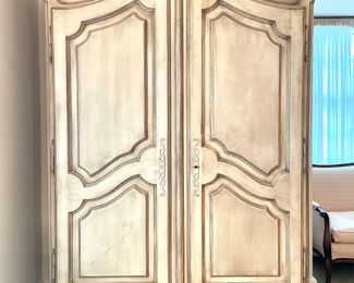 PRICED TO MOVE! $400; 59" x 21" x 84"; vintage French-style, two-door wardrobe with two hanging bars and shelves, and floral carvings.Please be prepared to hire your own muscle. Located on the 2nd floor, bend in staircase. 