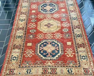 SOLD; 3.5' x 5'; Rug #2; hand-knotted, wool rug with base color of terracotta
