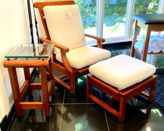 $2800; 28" x 35" x 42" chair, 23" x 20" x 18" ottoman; Reclining teak chair with cushion and ottom with cushion for Summit Furniture by Kipp Stewart                                        $1400; 17" x 15" x 27"; teak side table with removable glass top for Summit Furniture by Kipp Stewart 