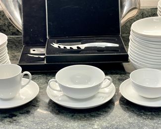$20 per piece (or set with cups/saucer) (many available); entire service of Arzberg white dinnerware; pricing per piece--salad plates, dessert plates soup bowls, luncheon plates, dinner plates, cereal bowls, different stylesof cups and saucers