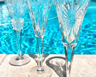 $720; set of 12 Waterford toasting flutes (#13 is chipped and thrown into the set for free)