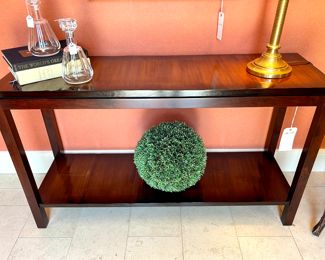 $1800 - Console table with wavy veneer finish by Williams Sonoma Home - 54x17x32; $250/each - Baccarat crystal decanter (2 available); $16 - Faux boxwood ball