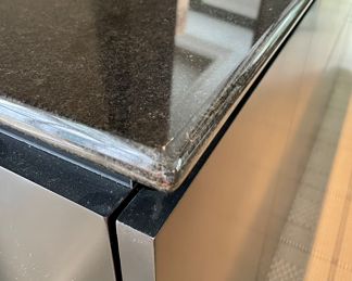 Detailed top view of the black lacquer credenza
