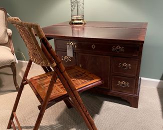 $500; 24" x 15" x 36; antique Italian secretary desk (made in Verona)                                                                         
$120 each (10 available); vintage caned folding chair with custom cushion;                                                              
$140; 7" x 27.75"; Waterford cut crystal and brass lamp with Waterford lamp