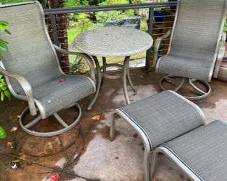 Two Swivel Patio Chairs with Ottamans and Table