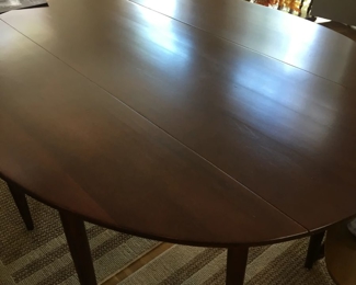 Gorgeous Stickley Rosewood Drop leaf table in a beautiful oval size.  Large enough for the entire family, with one large leaf...very versatile and in excellent shape!