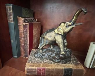 24. Metal Elephant Sculpture (8" x 8")