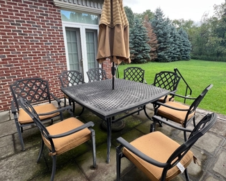 37. Basketweave Cast Aluminum Dining Table (60"sq) and Set of 8 Arm Chairs w/ Cushions and Umbrella 