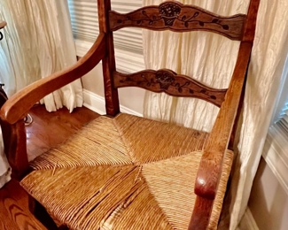 57. Carved Ladderback Arm Chair w/ Rush Seat (21" x 19" x 41") (as is)