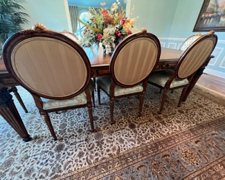 109. Invincible Fine Furniture Carved Dining Table w/ 2-24" leaves (48" x 96") and a set of 8 Chairs - 2 Arm (24" x 24" x 41") 6 Side (24" x 24" x 41") w/ 2-24" leaves