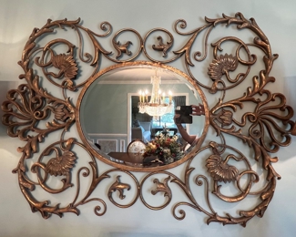 113. Beveled Mirror w/ Scroll Metal Frame (58" x 40")