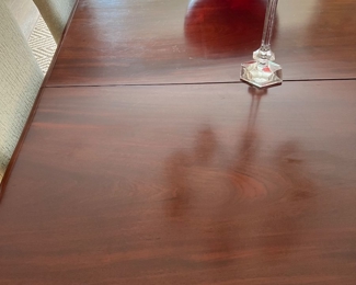 30. English Mahogany Dining Table on Casters w/ 3-25" leaves and Pads (49" x 50" x 29")