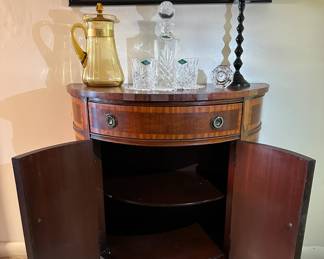 The console and gold pitcher are sold.