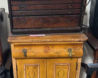 The cabinet on top is sold.