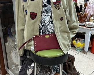 The red clutch and stool are sold.