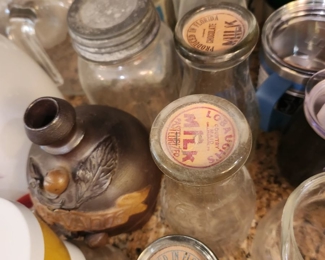 Milk bottles - vintage/antique
