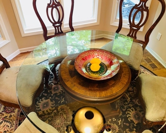 $400
ROUND GLASS TABLE WITH WOOD PEDESTAL AND CHAIRS 
TABLE 54”DIA x 30”H
CHAIR 24”W x 23”D x 43”H