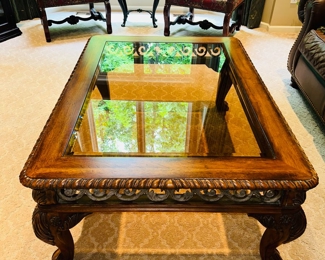$150
OUTLOOK INTERNATIONAL, LTD WOOD AND GLASS COFFEE TABLE 
50”L x 36.5”W x 20.5”H 
