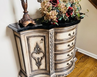 $295 CABINET / $40 FLORAL ARRANGEMENT
VESTIBULE ORNATE WOODEN CABINET WITH DOORS AND DRAWERS 
49”L x 20”D x 36”H
