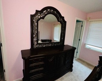 $300
ORNATE DARK BROWN QUEEN SIZE BEDROOM SET
DRESSER WITH MIRROR 
69”L x 18.5”D x 38”H 
MIRROR 49”H
QUEEN BED FRAME 92”L x 66”W x 74”H 
TWO NIGHTSTANDS 30”W x 17”D x 30”H