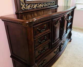 $300
ORNATE DARK BROWN QUEEN SIZE BEDROOM SET
DRESSER WITH MIRROR 
69”L x 18.5”D x 38”H 
MIRROR 49”H
QUEEN BED FRAME 92”L x 66”W x 74”H 
TWO NIGHTSTANDS 30”W x 17”D x 30”H