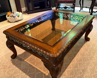 $150
OUTLOOK INTERNATIONAL, LTD WOOD AND GLASS COFFEE TABLE 
50”L x 36.5”W x 20.5”H 