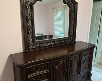 $300
ORNATE DARK BROWN QUEEN SIZE BEDROOM SET
DRESSER WITH MIRROR 
69”L x 18.5”D x 38”H 
MIRROR 49”H
QUEEN BED FRAME 92”L x 66”W x 74”H 
TWO NIGHTSTANDS 30”W x 17”D x 30”H
