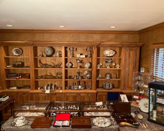 Den:  This is an overview of the "smalls area" in this room.  There is:  jewelry; sterling flatware; crystal; sterling mint julep cups; silver-plate; signed baseballs; numerous Limoges trinket boxes; Herend; Baccarat; and more!  Closer photos follow.