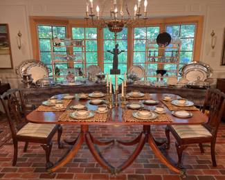 Dining Room:  The two-tone dining room table with banding is shown with two of its pedestal bases BUT there is another base and three leaves!  As shown it measures  47" x 76," but the additional pedestal and three leaves (26" + 26" + 38") can extend it to a maximum of  almost 14 feet! The next photo shows the table top without any china on it.