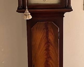 Foyer:  This petite clock is 78" tall.  The case appears to be old but it has been electrified.  Inside is a "Telechron Motor Model M31, Emerson Clock Co."