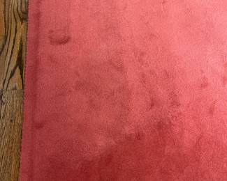 Family Room:  A large raspberry color area rug measures 14'  8"  x  10'  9."