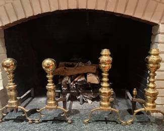 Family Room:  Two sets of heavy brass andirons are each priced. They are both by HARVIN for Virginia Metalcrafters.