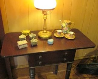 Beautiful Pink Globe on Brass Lamp as picture shows w/out being on.  Drop leaf table w/ two drawers 