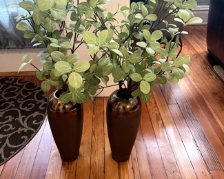 pair of vases with artificial greenery