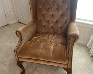 Antique brown velvet arm chair