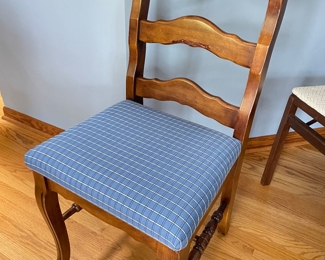 Wooden chair with blue upholstered seat, $34