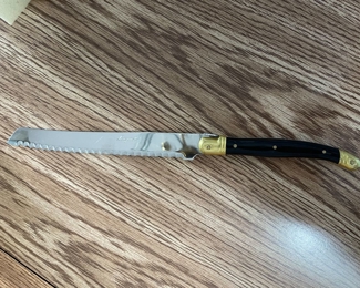 Jean Dubost "Laguiole" serated knife black & gold,  $15