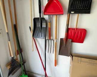 Assortment of shovels and rakes available to purchase at in home sale ~