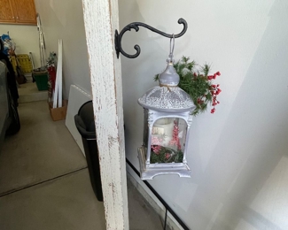 Wood pole holding a lantern, 55"H,  $48