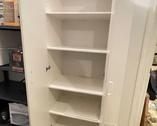 Additional view of white cabinet shelving ~