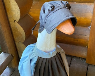 Porch goose with whole box of clothes (for goose)
