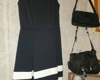 Many Racks of Designer Clothing! Mostly Women’s Size Small to Medium, Size 4 - 8. Notable Brands: Ann Taylor, Cache, White House Black Market, Calvin Klein, Bebe, Guess, Micheal Kors, BCBG Maxazria, Banana Republic, Zara, and More! 