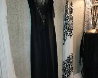 Many Racks of Designer Clothing! Mostly Women’s Size Small to Medium, Size 4 - 8. Notable Brands: Ann Taylor, Cache, White House Black Market, Calvin Klein, Bebe, Guess, Micheal Kors, BCBG Maxazria, Banana Republic, Zara, and More! 