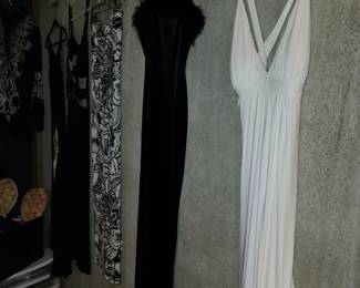 Many Racks of Designer Clothing! Mostly Women’s Size Small to Medium, Size 4 - 8. Notable Brands: Ann Taylor, Cache, White House Black Market, Calvin Klein, Bebe, Guess, Micheal Kors, BCBG Maxazria, Banana Republic, Zara, and More! 