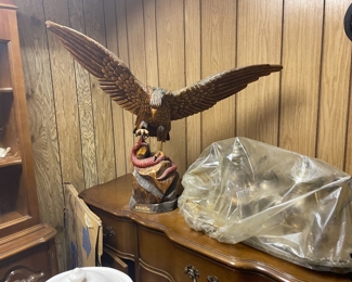 . . . another unbelievable carved eagle snatching a snake