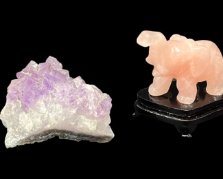 Amethyst Cluster and a rose Quartz Elephant on a wooden Stand
